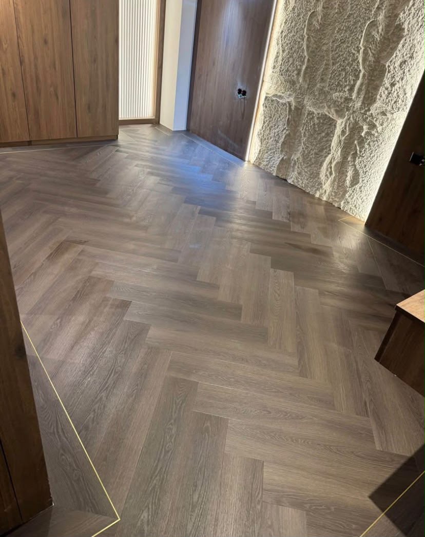 Finished herringbone hybrid flooring